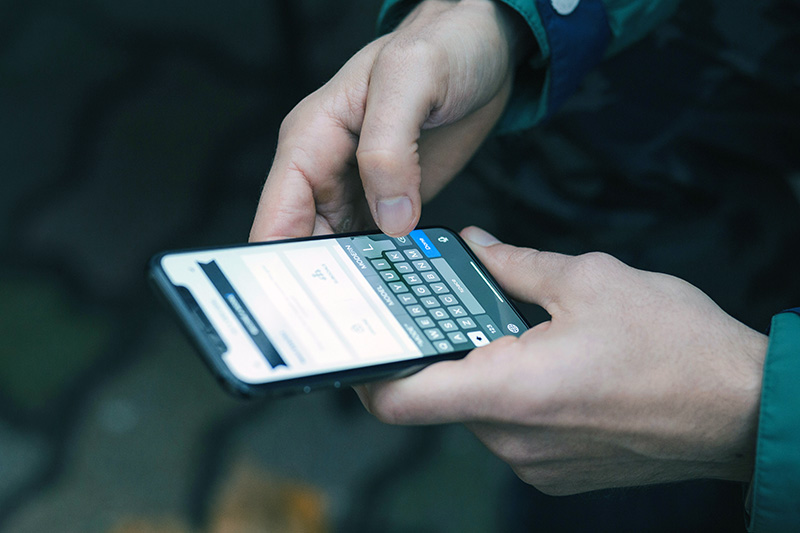 Landlord communicating with a tenant on a smartphone