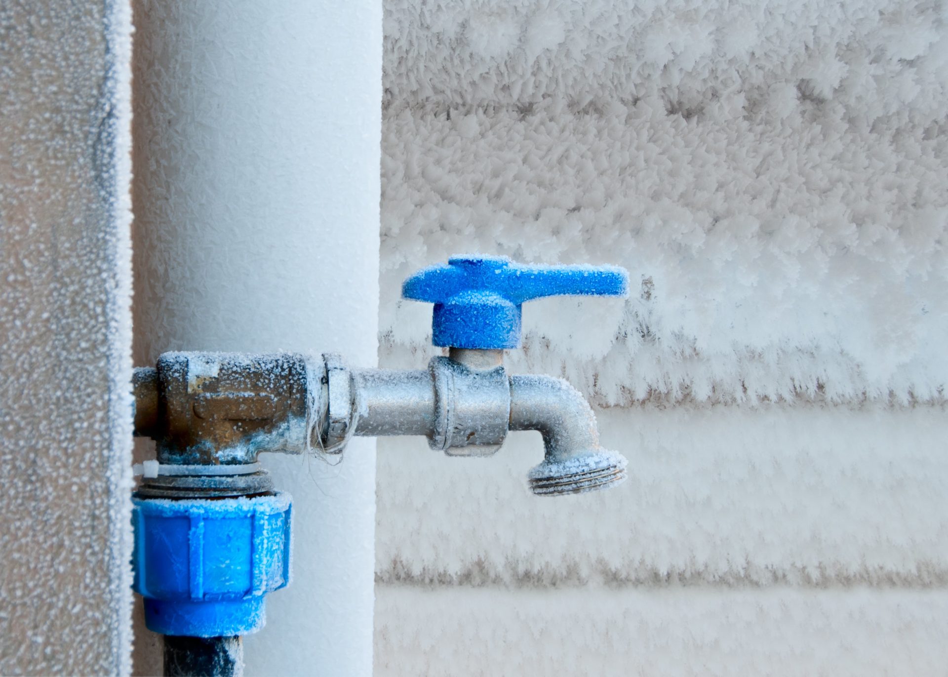 A photo of Frozen Pipes and outdoor tap on a rental property, a common issue for rental maintenance.