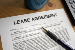 A paper lease agreement on a desk