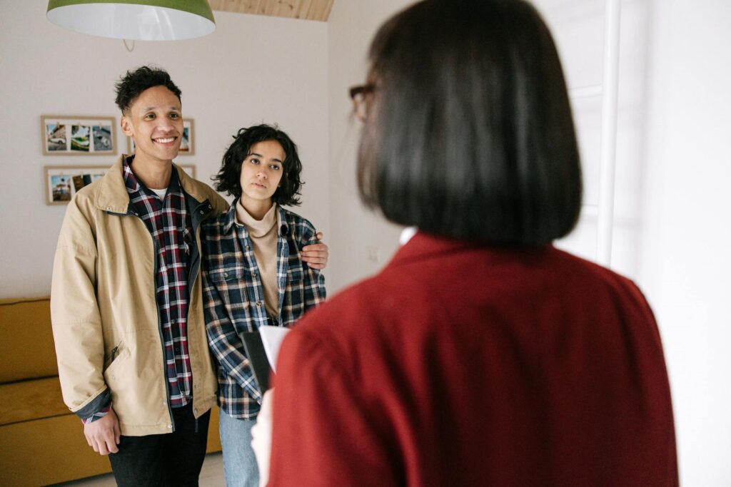 Young tenants with fake smiles