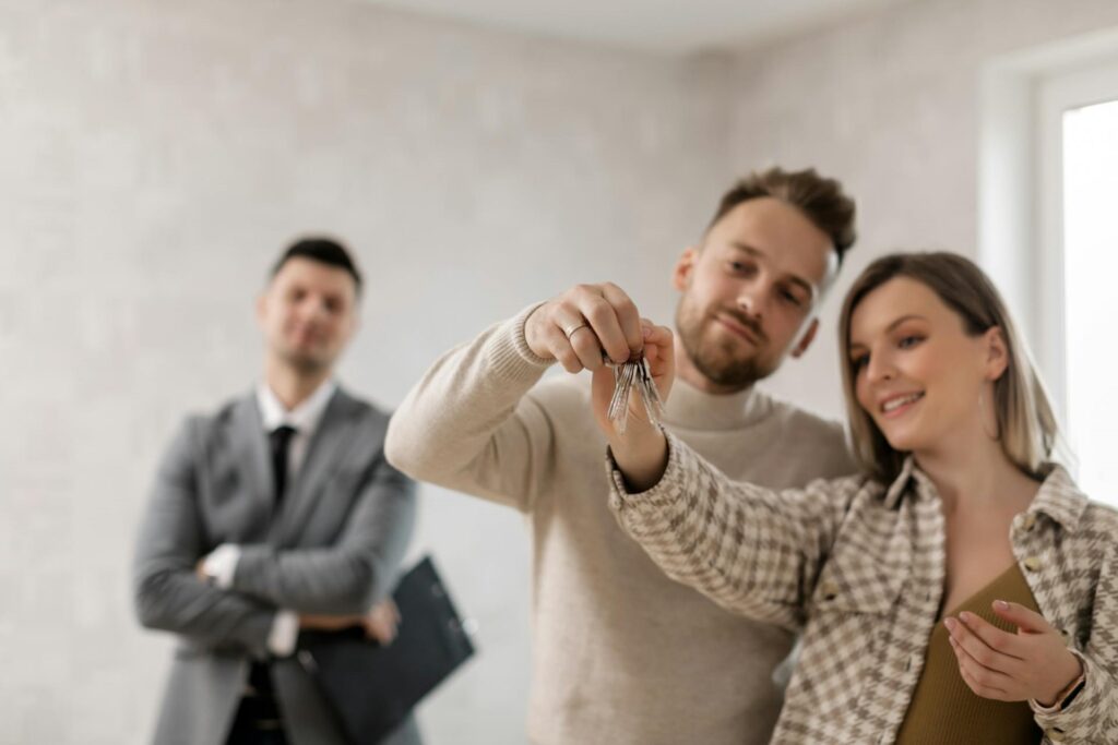 New tenants holding keys.