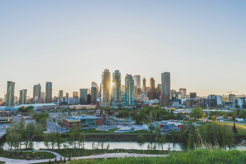 Calgary, Alberta's downtown skyline showing highrise buildings with condo real estate for sale